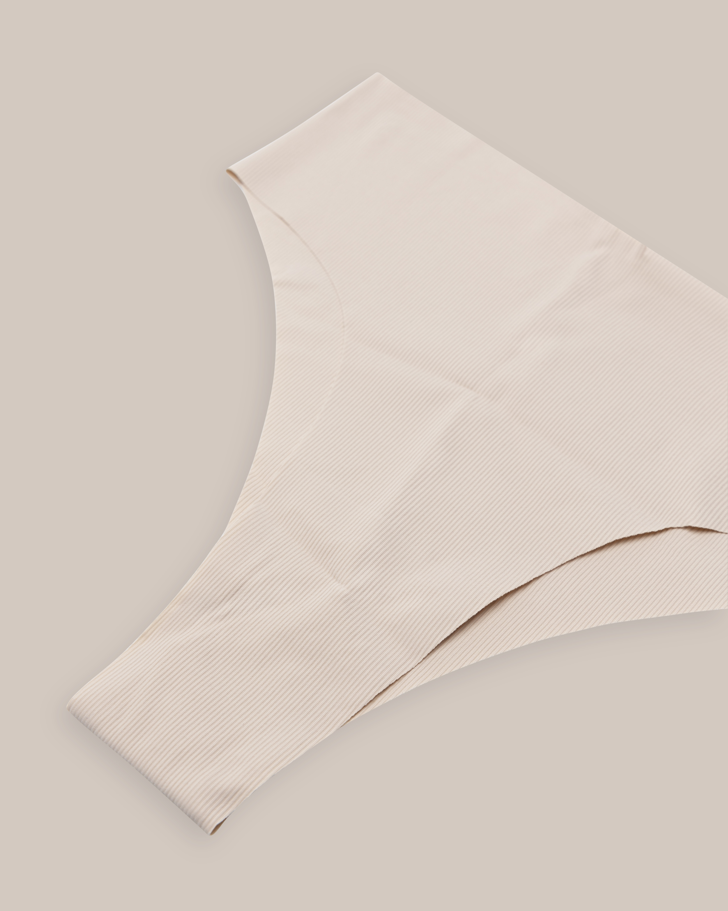 Mustat laserleikatut brasilialaiset pikkuhousut Tina Nude-beige